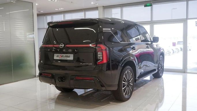 Подержанный Nissan Patrol VII (Y63), 3.5 л, 2025 в Шардже от Alsalama Motors Черный цвет. GCC | AUTO.AE