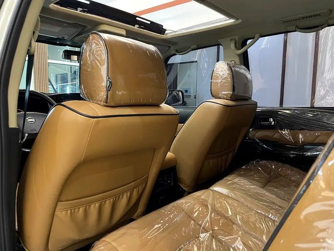Подержанный Nissan Patrol V (Y61) Рестайлинг, 4.8 л, 2021 в Шардже от Alzawraq Alazrak Белый цвет. GCC | AUTO.AE