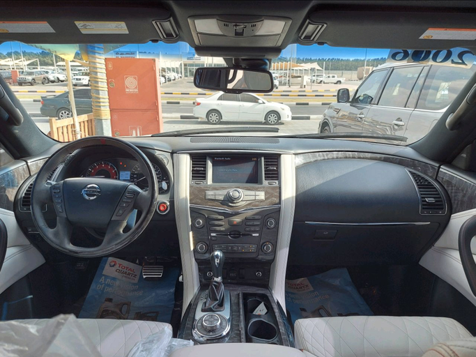 Used Nissan Patrol VI (Y62) Facelift, 5.6 l, 2016 in Sharjah by Alsabah Used Cars, White color. GCC Specs | AUTO.AE