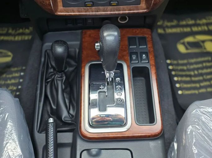 Подержанный Nissan Patrol V (Y61) Рестайлинг, 4.8 л, 2021 в Шардже от Al Jana Used Cars Белый цвет. GCC | AUTO.AE