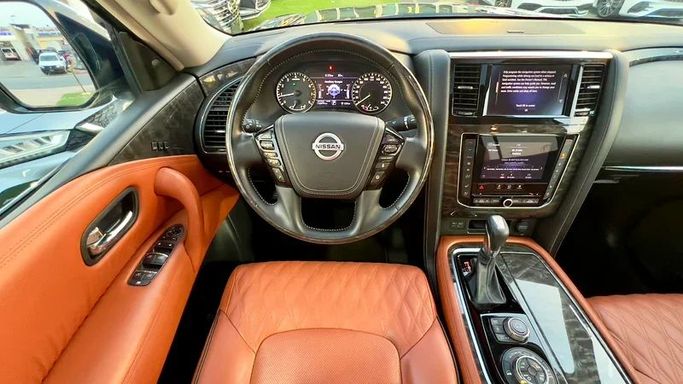 Подержанный Nissan Patrol VI (Y62) Рестайлинг 2, 5.6 л, 2021 в Шардже от Ali Abood Used Cars Черный цвет. GCC | AUTO.AE