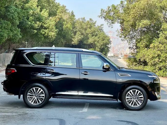 Подержанный Nissan Patrol VI (Y62) Рестайлинг 2, 5.6 л, 2021 в Шардже от Ali Abood Used Cars Черный цвет. GCC | AUTO.AE