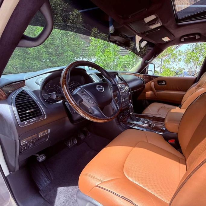 Used Nissan Patrol VI (Y62) Facelift, 5.6 l, 2015 in Sharjah by Sarmad Cars, Tan color. Other | AUTO.AE