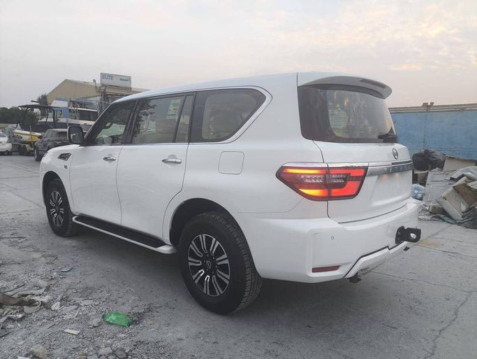 Подержанный Nissan Patrol VI (Y62) Рестайлинг 2, 5.6 л, 2023 в Шардже Белый цвет. GCC | AUTO.AE