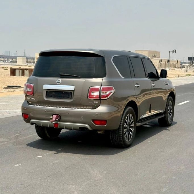 Подержанный Nissan Patrol VI (Y62) Рестайлинг, 5.6 л, 2018 в Шардже от Sarmad Cars Золотистый цвет. GCC | AUTO.AE