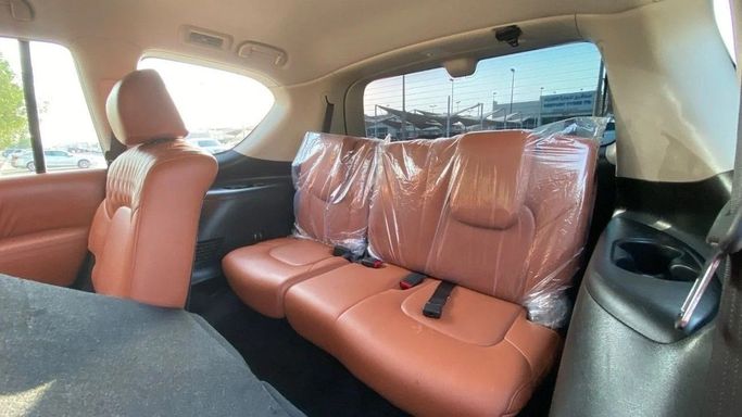 Подержанный Nissan Patrol VI (Y62) Рестайлинг 2, 4.0 л, 2020 в Шардже от Halla Cars Белый цвет. GCC | AUTO.AE