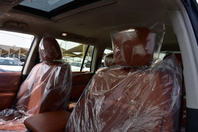 Подержанный Nissan Patrol VI (Y62) Рестайлинг 2, 4.0 л, 2024 в Шардже от Alfaris Used Cars Черный цвет. GCC | AUTO.AE