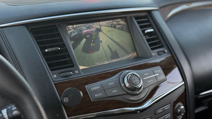 Подержанный Nissan Patrol VI (Y62), 5.6 л, 2013 в Шардже от Badar Used Cars Белый цвет. GCC | AUTO.AE