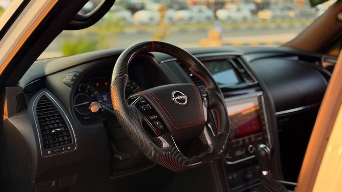 Used Nissan Patrol VI (Y62) Facelift 2, 4.0 l, 2020 in Sharjah by Badar Used Cars, White color.  | AUTO.AE