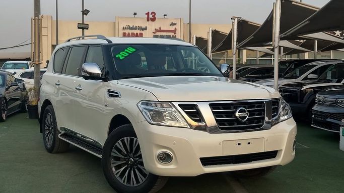 Подержанный Nissan Patrol VI (Y62) Рестайлинг, 5.6 л, 2018 в Шардже от Badar Used Cars Белый цвет.  | AUTO.AE