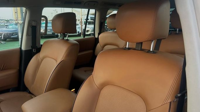 Подержанный Nissan Patrol VI (Y62) Рестайлинг, 5.6 л, 2018 в Шардже от Badar Used Cars Белый цвет.  | AUTO.AE