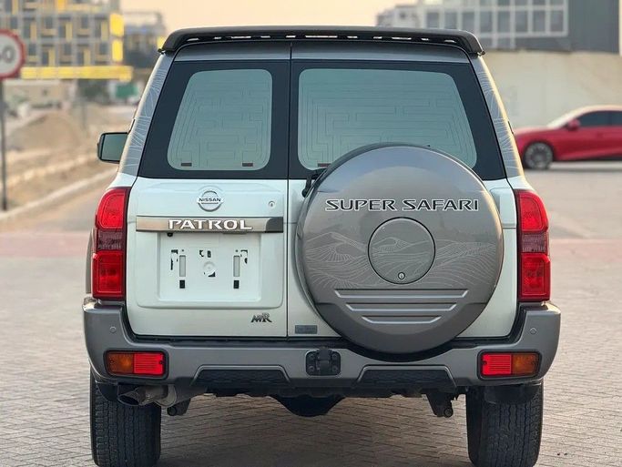 Used Nissan Patrol V (Y61) Facelift, 4.8 l, 2024 in Sharjah by Al Ahd Used Cars, White color. GCC Specs | AUTO.AE