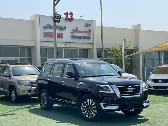Подержанный Nissan Patrol VI (Y62) Рестайлинг 2, 5.6 л, 2021 в Шардже от Badar Used Cars Черный цвет.  | AUTO.AE