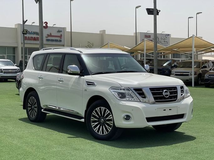 Подержанный Nissan Patrol VI (Y62) Рестайлинг, 5.6 л, 2017 в Шардже от Badar Used Cars Белый цвет.  | AUTO.AE