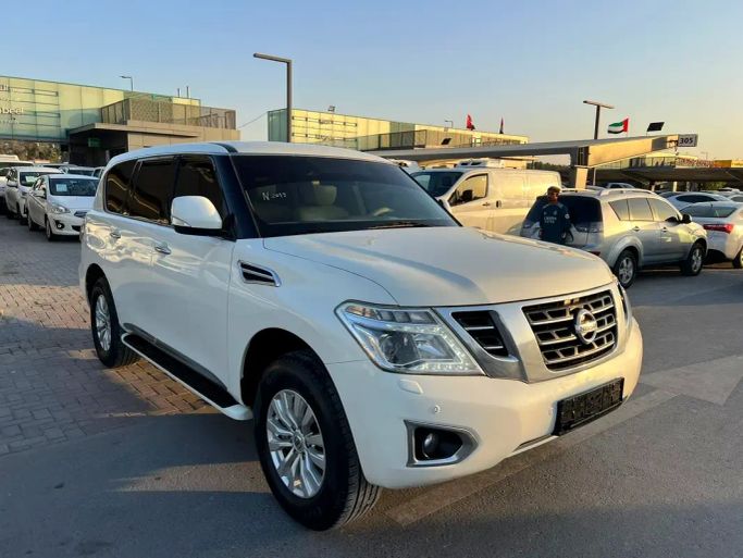 Подержанный Nissan Patrol VI (Y62) Рестайлинг, 4.0 л, 2019 в Шардже от Al Nabeel Used Cars Белый цвет.  | AUTO.AE