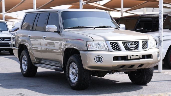 Used Nissan Patrol V (Y61) Facelift, 4.8 l, 2016 in Sharjah by Almalakyah Cars, Golden color. GCC Specs | AUTO.AE | Listing #267518