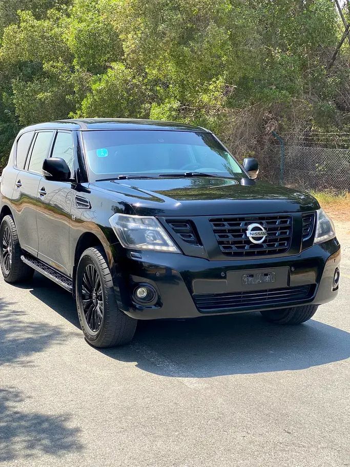 Подержанный Nissan Patrol VI (Y62) Рестайлинг, 5.6 л, 2016 в Шардже от Najm Al Shamal Used Cars Черный цвет. GCC | AUTO.AE | Объявление #273548