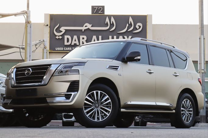 مستعملة ⁦Nissan Patrol عملية فيس ليفت VI (Y62) 2، 5.6 l، 2020⁩ في في الإمارات, الشارقة من Dar Al Hay Used Cars، اللون ذهبي. مواصفات الخليج | AUTO.AE | إعلان #283950