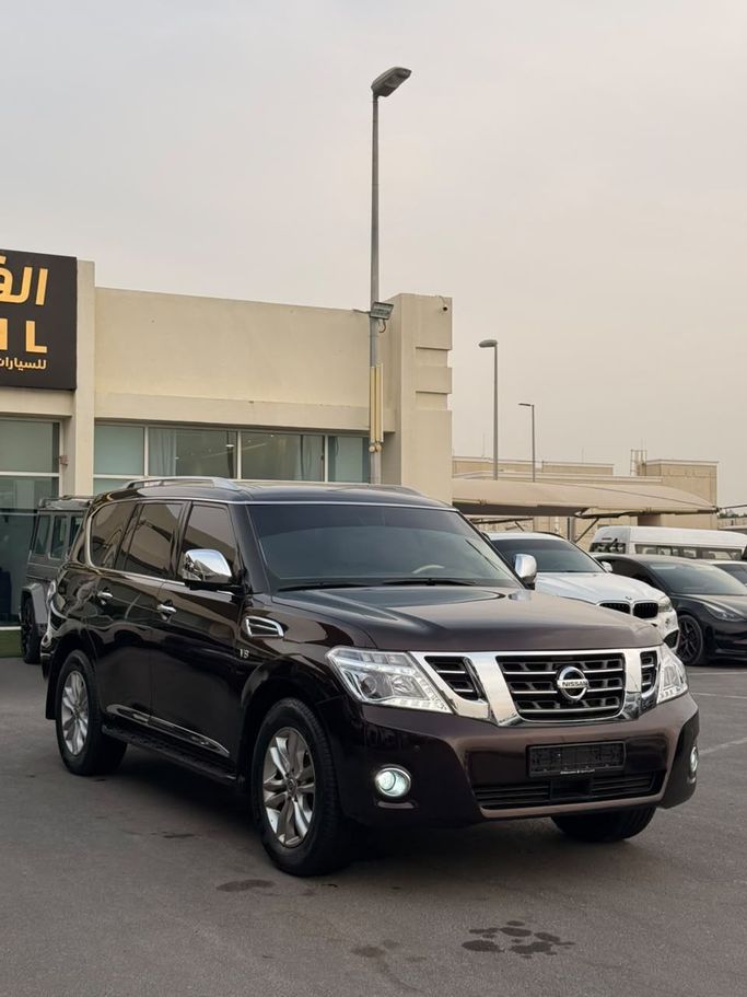 Подержанный ⁦Nissan Patrol VI (Y62), 5.6 л, 2013⁩ в ОАЭ, Шарджа от AL FADHL USED CARS Тёмно-бордовый цвет. GCC | AUTO.AE | Объявление #290140