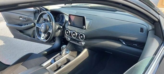 Used Nissan Sentra VIII (B18), 2.0 l, 2021 in Sharjah by Tabarak Used Cars, Black color. American Specs | AUTO.AE