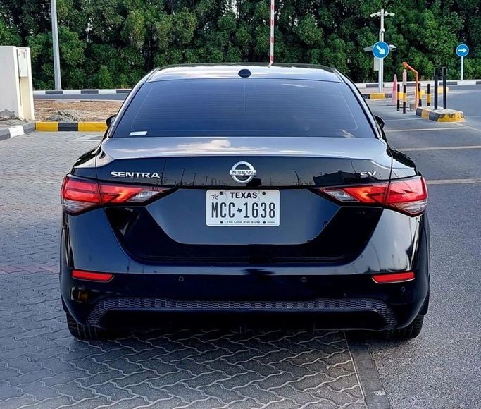 Used Nissan Sentra VIII (B18), 2.0 l, 2021 in Sharjah by Tabarak Used Cars, Black color. American Specs | AUTO.AE