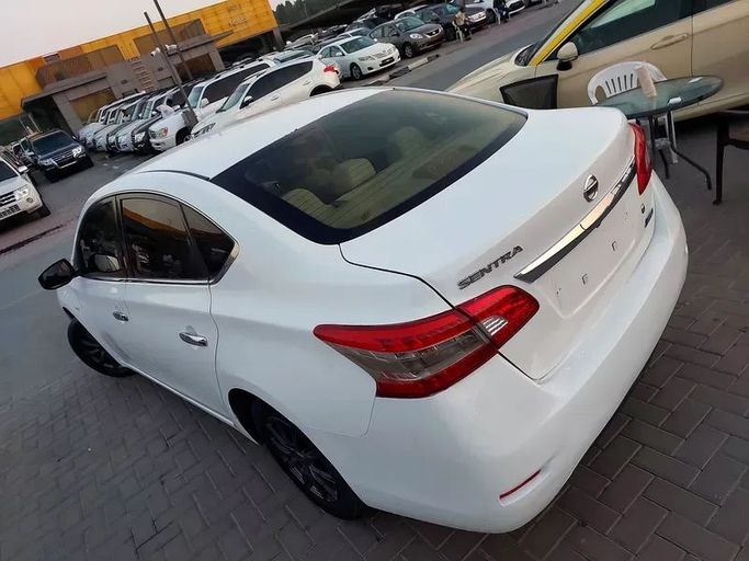 Used Nissan Sentra VII (B17), 1.8 l, 2014 in Sharjah by Al Aqsa Used Cars, White color. GCC Specs | AUTO.AE