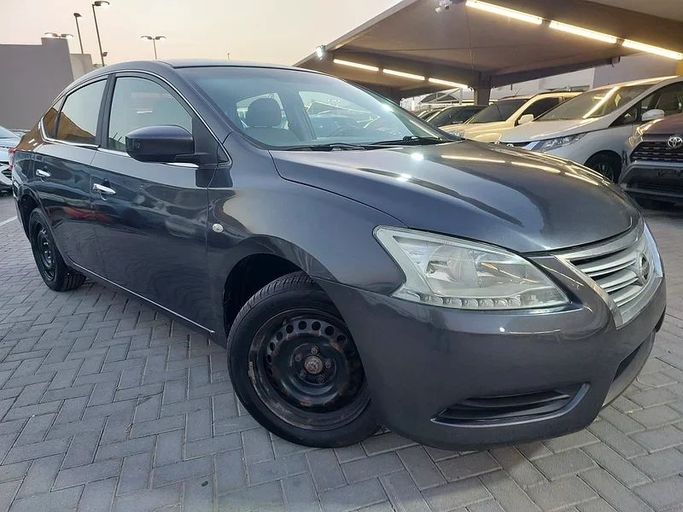 Подержанный Nissan Sentra VII (B17), 1.8 л, 2014 в Шардже от Al Aqsa Used Cars Серый цвет. GCC | AUTO.AE