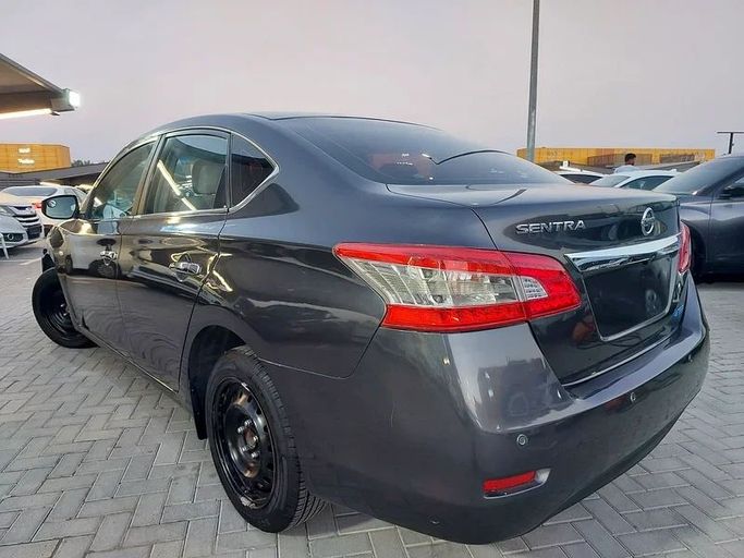 Подержанный Nissan Sentra VII (B17), 1.8 л, 2014 в Шардже от Al Aqsa Used Cars Серый цвет. GCC | AUTO.AE