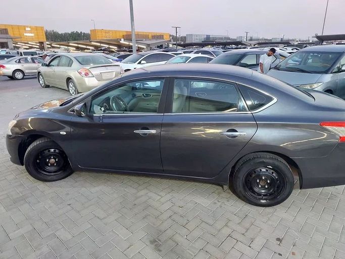 Подержанный Nissan Sentra VII (B17), 1.8 л, 2014 в Шардже от Al Aqsa Used Cars Серый цвет. GCC | AUTO.AE