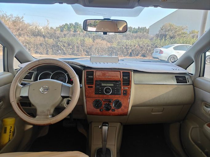 Used Nissan Tiida I, 1.8 l, 2008 in Sharjah, Golden color. GCC Specs | AUTO.AE