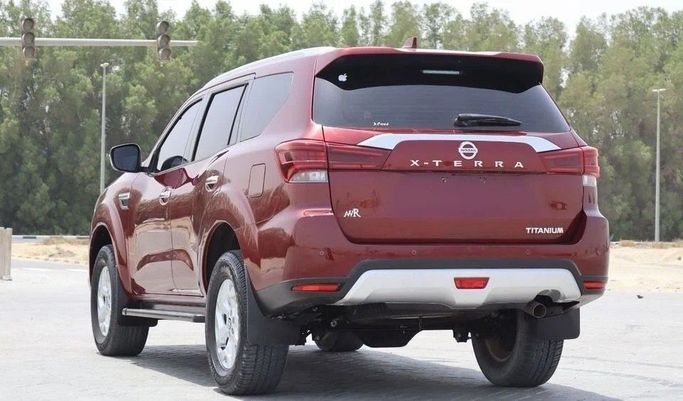 Подержанный Nissan X-Terra, 2.5 л, 2021 в Шардже от Al Sayed Khamis Used Cars Бордовый цвет. GCC | AUTO.AE