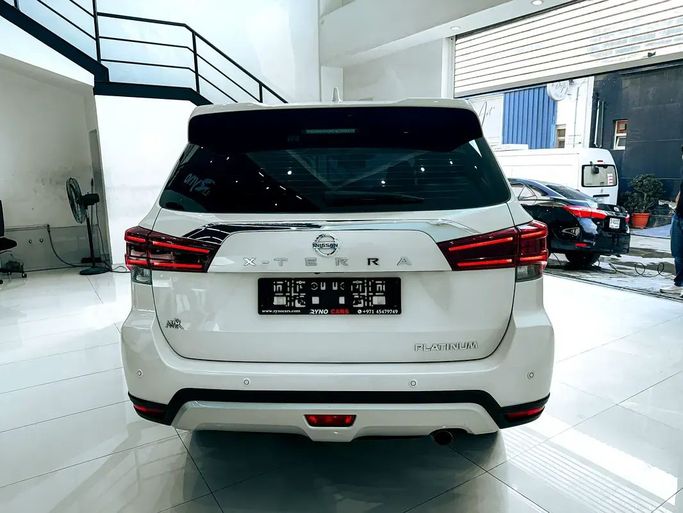Подержанный Nissan X-Terra, 2.5 л, 2023 в Шардже от Ryno Cars Белый цвет. GCC | AUTO.AE