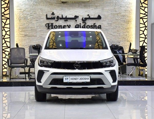Подержанный Opel Crossland X I Рестайлинг, 1.2 л, 2023 в Шардже от Honey Gidosha Used Cars Tr. Белый цвет.  | AUTO.AE