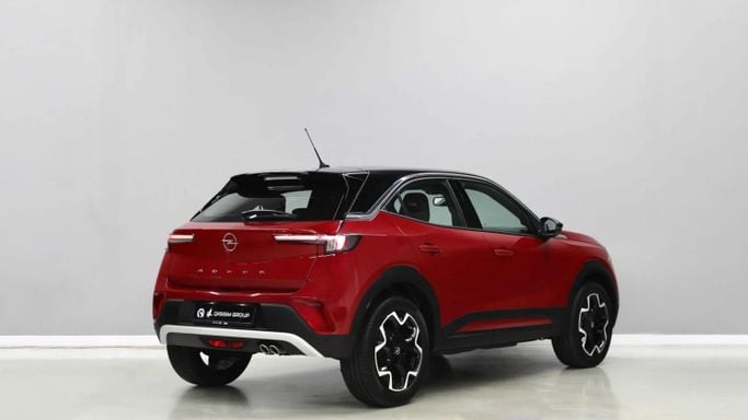 New Opel Mokka II, 1.2 l, 2023 in Sharjah by Al Qassem Cars Trading, Red color. GCC Specs | AUTO.AE
