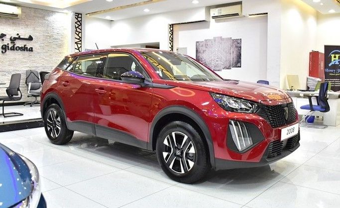 New Peugeot 2008 II Facelift, 1.2 l, 2025 in Sharjah by Honey Gidosha Used Cars Tr., Red color.  | AUTO.AE