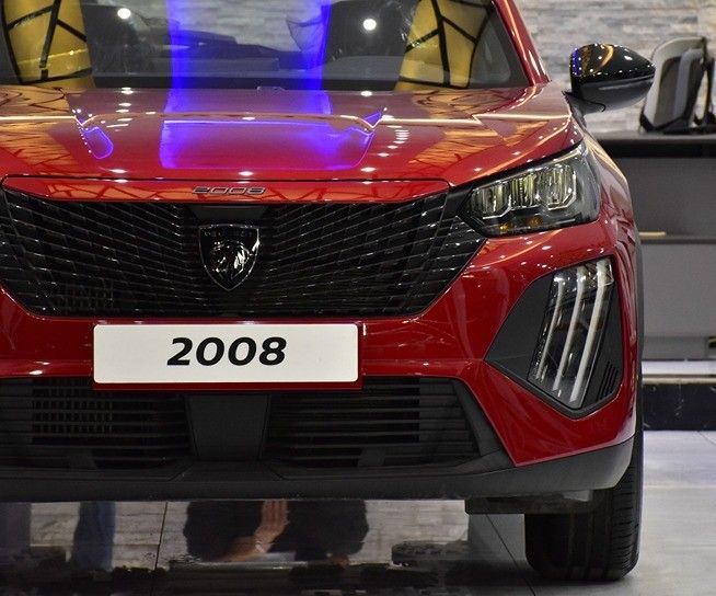 New Peugeot 2008 II Facelift, 1.2 l, 2025 in Sharjah by Honey Gidosha Used Cars Tr., Red color.  | AUTO.AE
