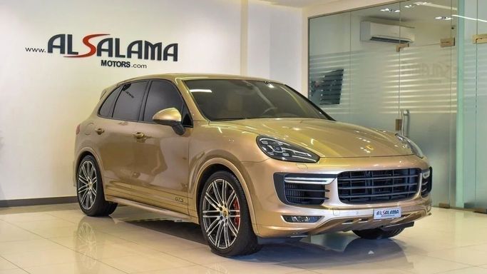 Подержанный Porsche Cayenne GTS II Рестайлинг (958), 3.6 л, 2016 в Шардже от Alsalama Motors Золотистый цвет. GCC | AUTO.AE