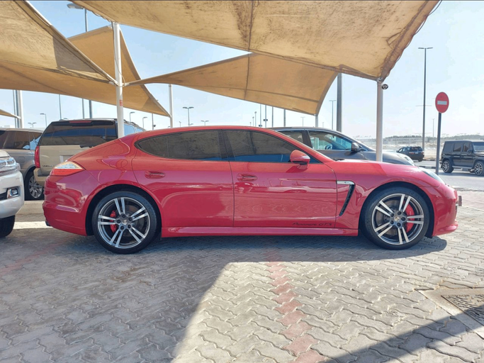 Used Porsche Panamera I, 3.6 l, 2013 in Sharjah by Fantastic Used Cars, Red color. GCC Specs | AUTO.AE
