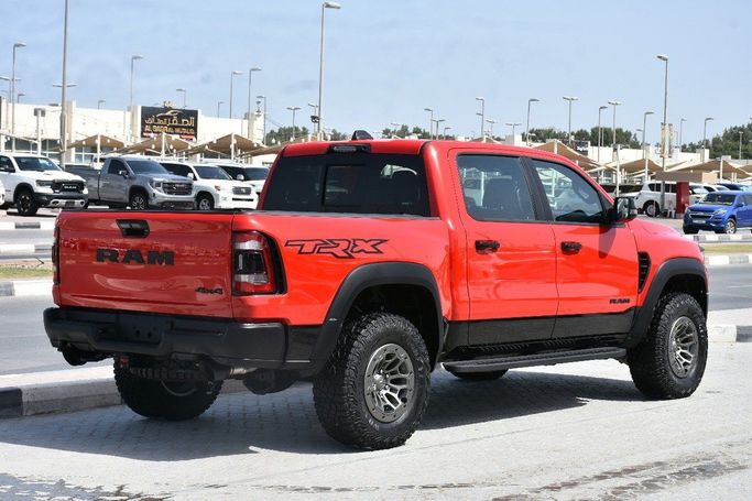 Подержанный RAM 1500 Crew Cab TRX V, 6.2 л, 2024 в Шардже от Alfaris Used Cars Красный цвет.  | AUTO.AE