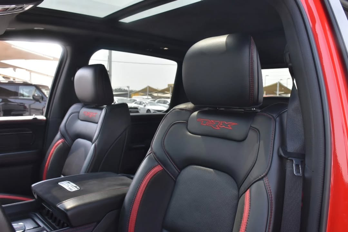 Подержанный RAM 1500 Crew Cab TRX V, 6.2 л, 2023 в Шардже от Alfaris Used Cars Красный цвет. Other | AUTO.AE