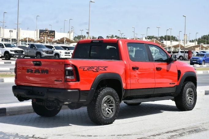 Подержанный RAM 1500 Crew Cab TRX V, 6.2 л, 2024 в Шардже от Alfaris Used Cars Красный цвет. Other | AUTO.AE