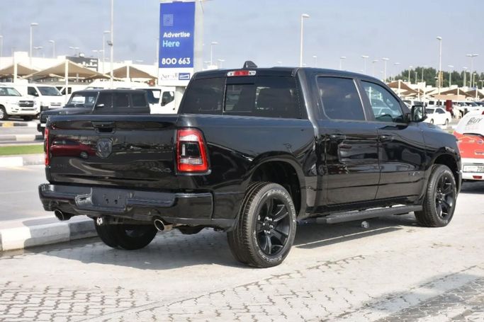 Подержанный RAM 1500 Crew Cab V, 3.6 л, 2023 в Шардже от Alfaris Used Cars Черный цвет. Other | AUTO.AE