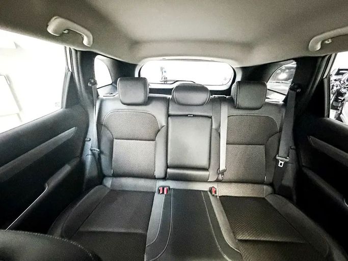 Подержанный Renault Koleos II Рестайлинг, 2.5 л, 2023 в Шардже от Ryno Cars Бордовый цвет. GCC | AUTO.AE