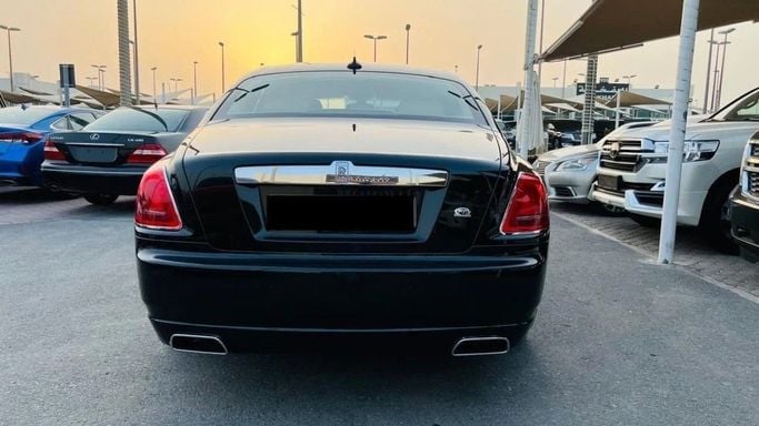 Used Rolls-Royce Ghost I, 6.6 l, 2012 in Sharjah by Titanium Used Cars, Black color. GCC Specs | AUTO.AE