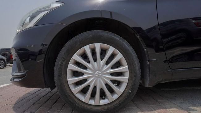 Подержанный Suzuki Ciaz I Рестайлинг, 1.5 л, 2023 в Шардже от Alnujoom Al Malakiah Used Cars Черный цвет. GCC | AUTO.AE