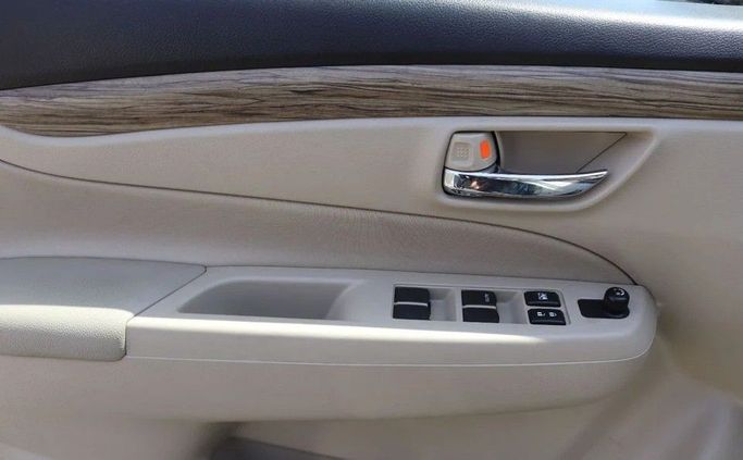 Подержанный Suzuki Ciaz I Рестайлинг, 1.5 л, 2023 в Шардже от Al Sayed Khamis Used Cars Белый цвет. GCC | AUTO.AE