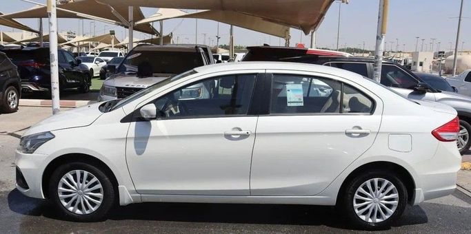 Подержанный Suzuki Ciaz I Рестайлинг, 1.5 л, 2023 в Шардже от Al Sayed Khamis Used Cars Белый цвет. GCC | AUTO.AE