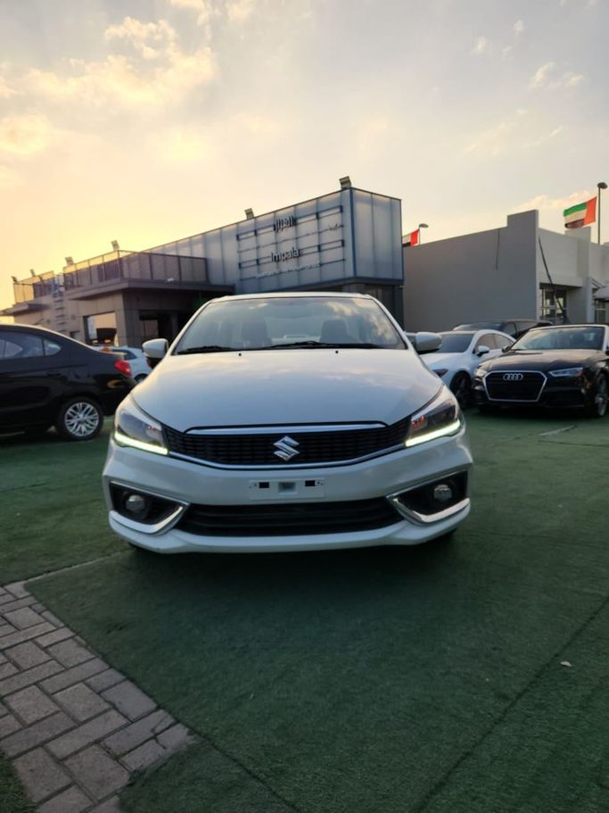 Used Suzuki Ciaz I Facelift, 1.5 l, 2023 in Sharjah by Impala Used Cars, White color. GCC Specs | AUTO.AE