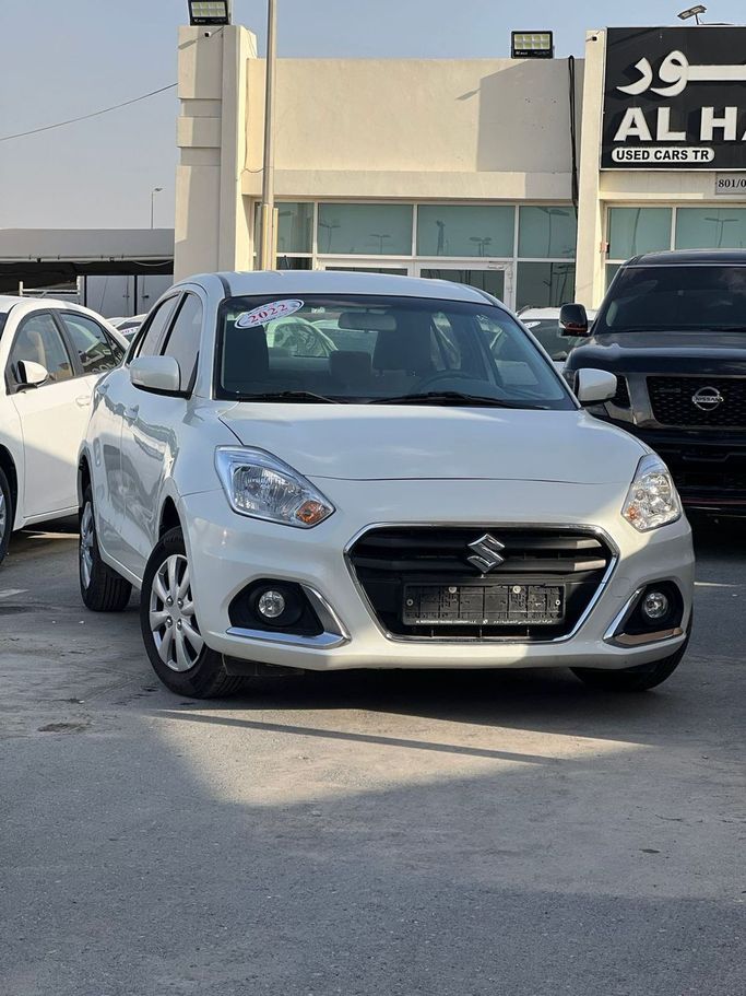 Подержанный Suzuki DZire III Рестайлинг, 1.2 л, 2022 в Шардже от Mohamed Zaki Younis Used Cars Серебристый цвет. Other | AUTO.AE