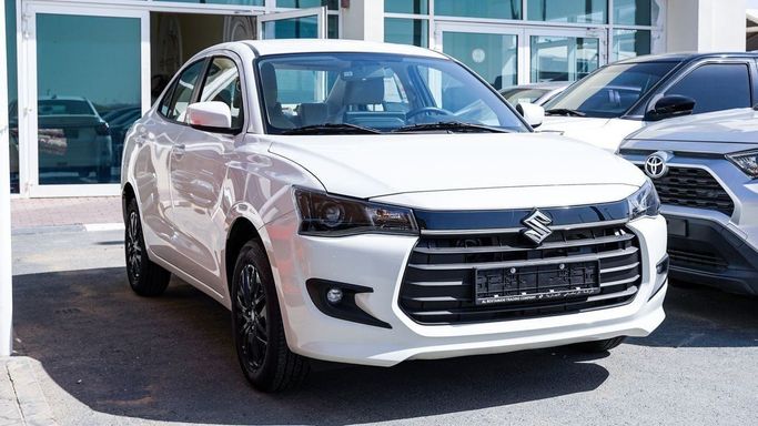 Новый Suzuki DZire IV, 1.2 л, 2026 в Шардже от Almalakyah Cars Белый цвет. GCC | AUTO.AE | Объявление #267440